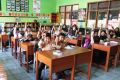 Medion Ajak Ratusan Siswa Makan Telur Bersama